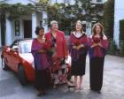 Sheila and bridesmaids in front of Pembroke Lodge, with MG